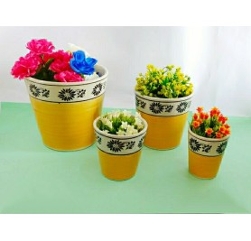 Set Of 4 Yellow And White Ceramic Pots